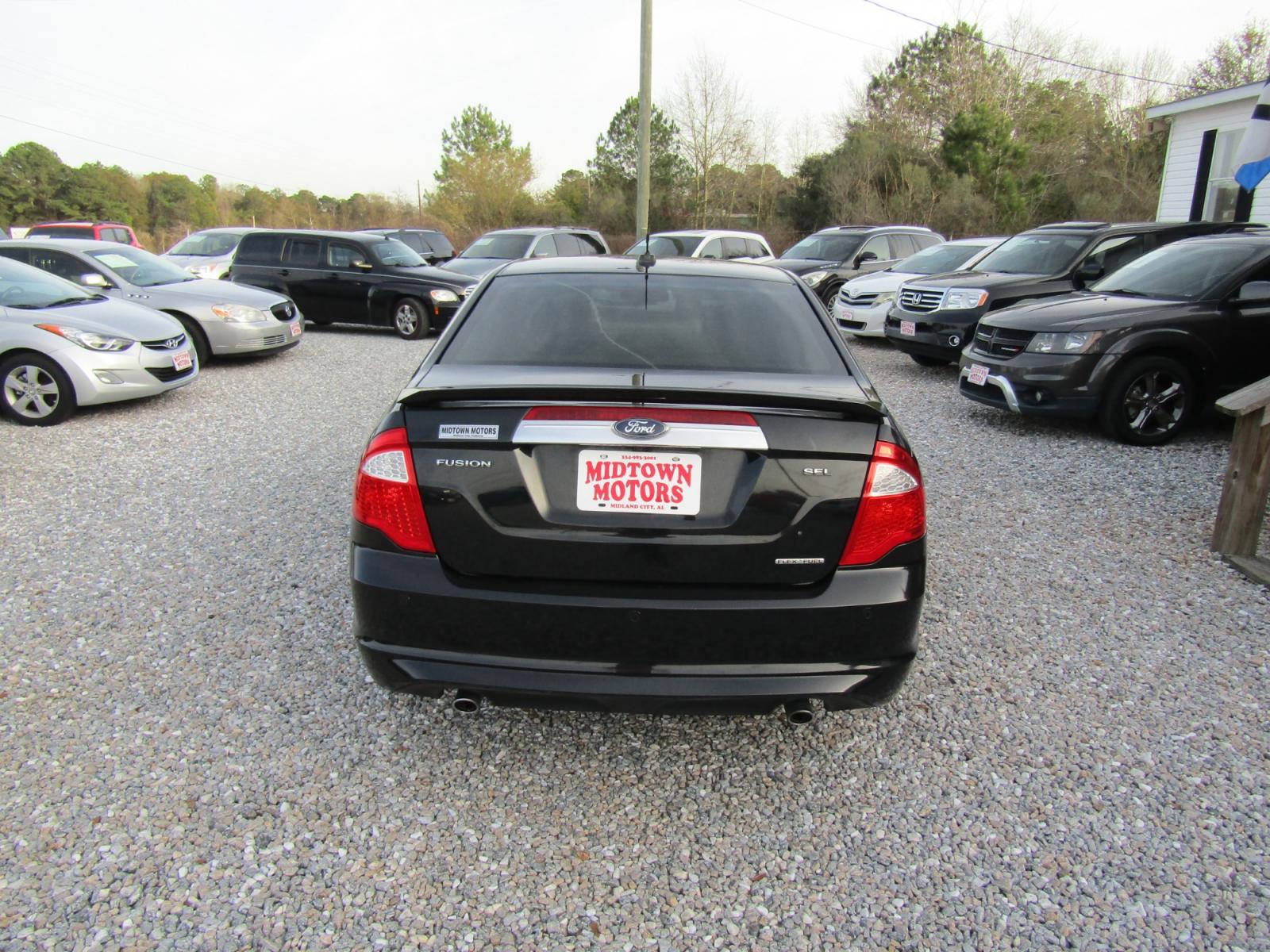 2011 Black /Tan Ford Fusion (3FAHP0JG4BR) , Automatic transmission, located at 15016 S Hwy 231, Midland City, AL, 36350, (334) 983-3001, 31.306210, -85.495277 - Photo #6
